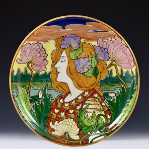 Large plate with female profile and floral decoration